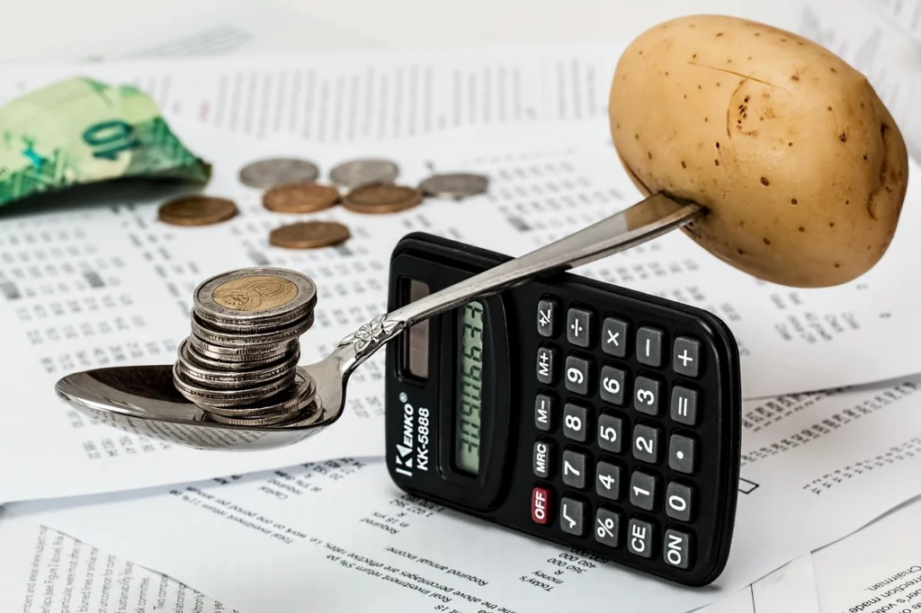 Calculator and budget planning materials for alternatives after being denied for a 0% APR card