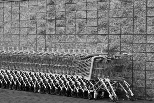 Shopping cart with a large electronics item, representing a big purchase financed with a 0% APR card